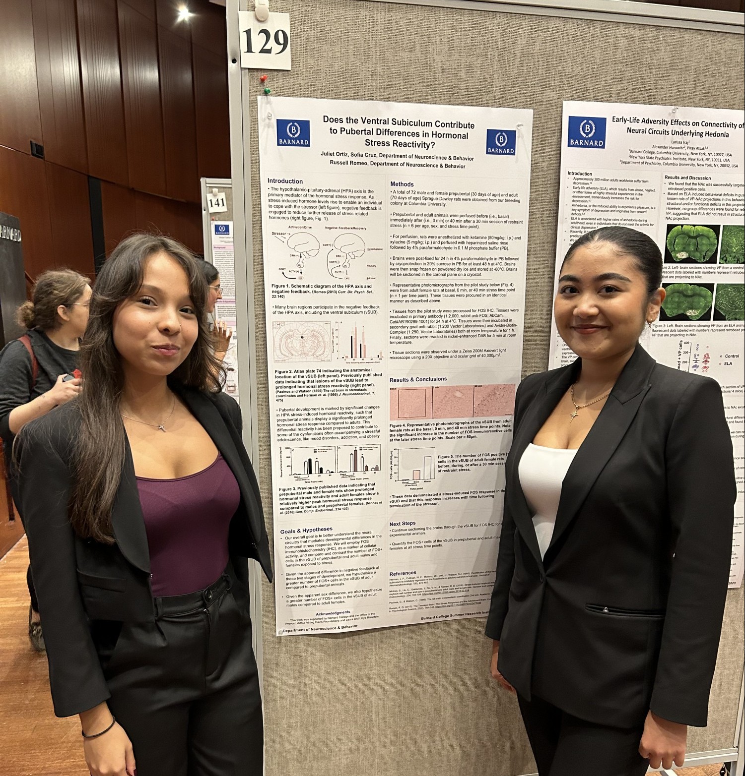 Sofia Cruz and Juliet Ortiz presenting their work at the 2023 Summer Research Institute Poster Session